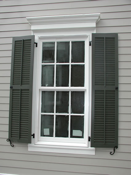 Classic Louvered Shutter with False Tilt Rod mounted on siding