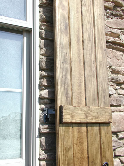 Board and Batten mounted on stone 