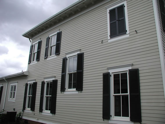 Exterior Shutter Sample from Sunbelt Shutters - Featuring Louvered, Board and Batten, Bahama, and Raised Panel Shutters