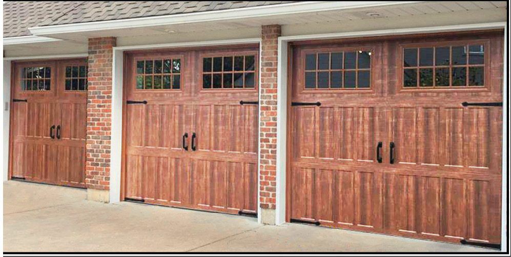 Carriage house garage doors with decorative hinge fronts and handles